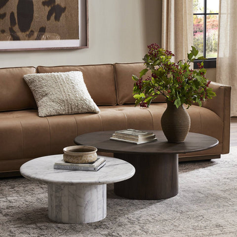 nesting tables for living room. one is dark wood, the other is white marble.